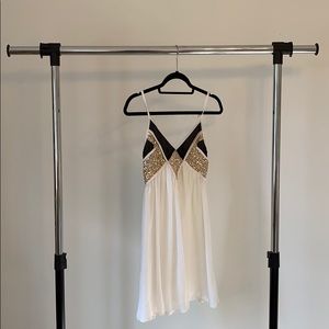 White and gold dress | Xenia Boutique